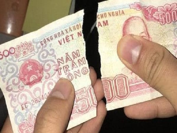 Mộng thấy đổi tiền rách
